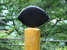 Wchter, gelber pers. Travertin u. Nero di Belgio, 187 x 52 x 52 cm, 2007